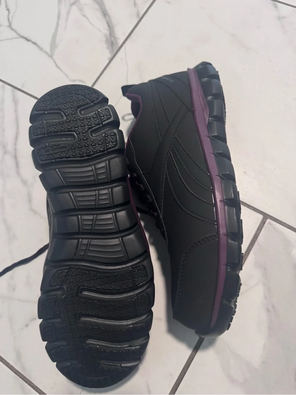 Steel toe Reebok Black Sneakers with Purple Lining and Green Insoles